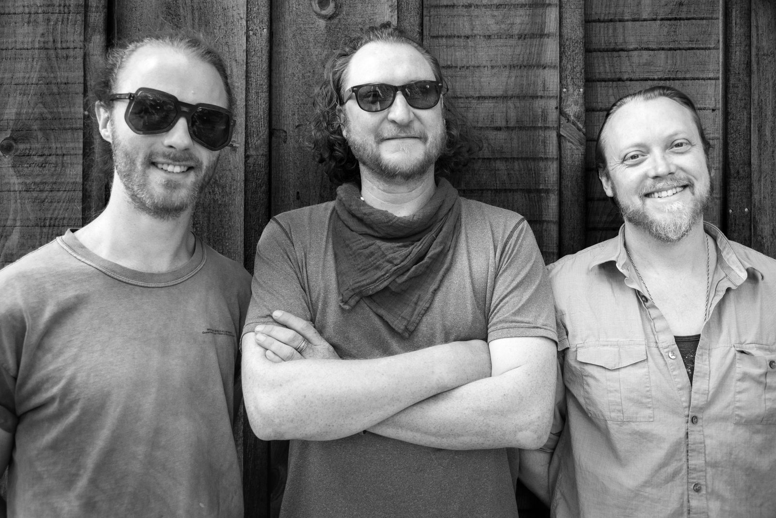 Biotonic trio: against a barn wall