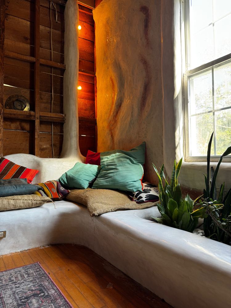 Plaster window bench with built-in planter at The Tavern